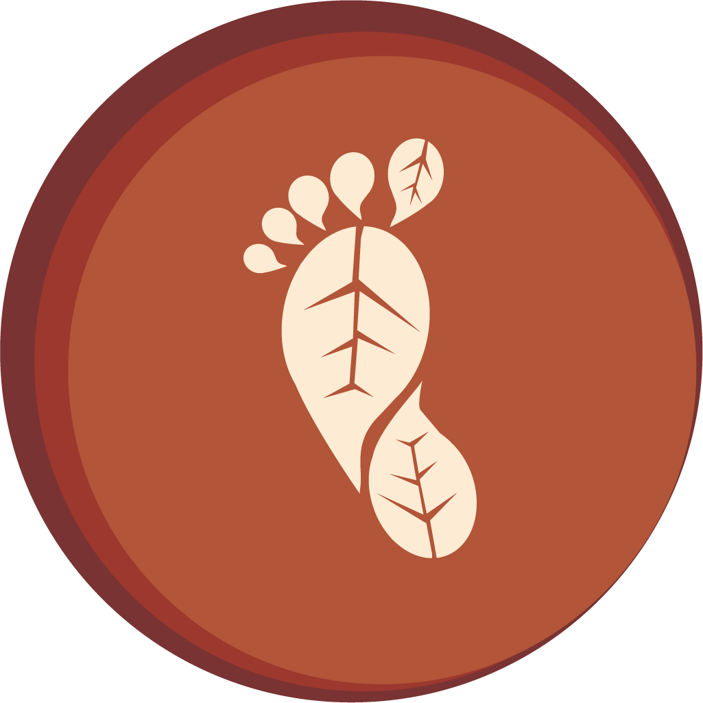 Cartoon footprint in a circle with leaf patterns on the ball and big toe of the foot.