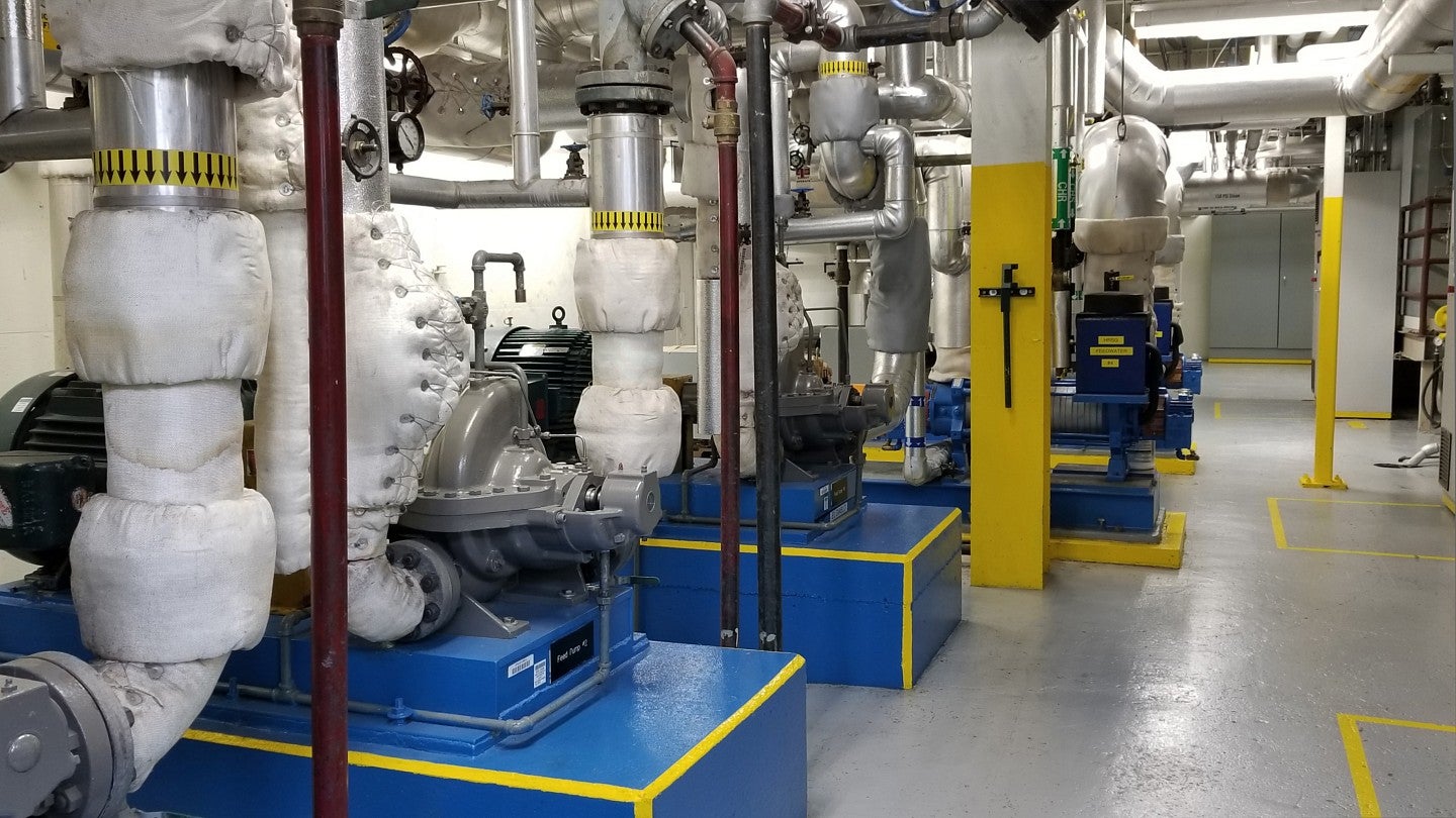 Color photo of a machinery room in the UO Power Plant