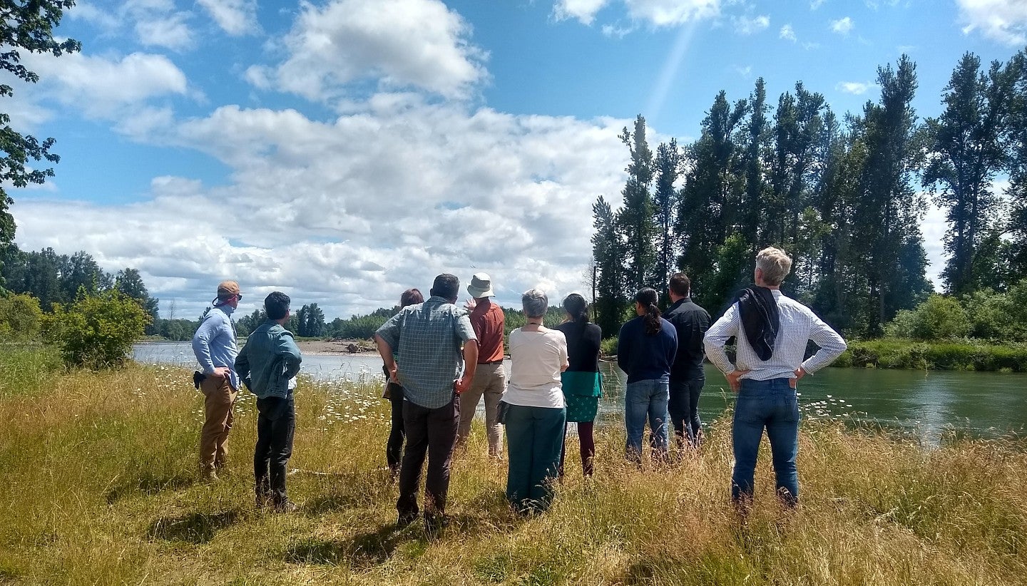 UO faculty talk with community partner at McKenzie River Trust's Green Island on the Willamette River.