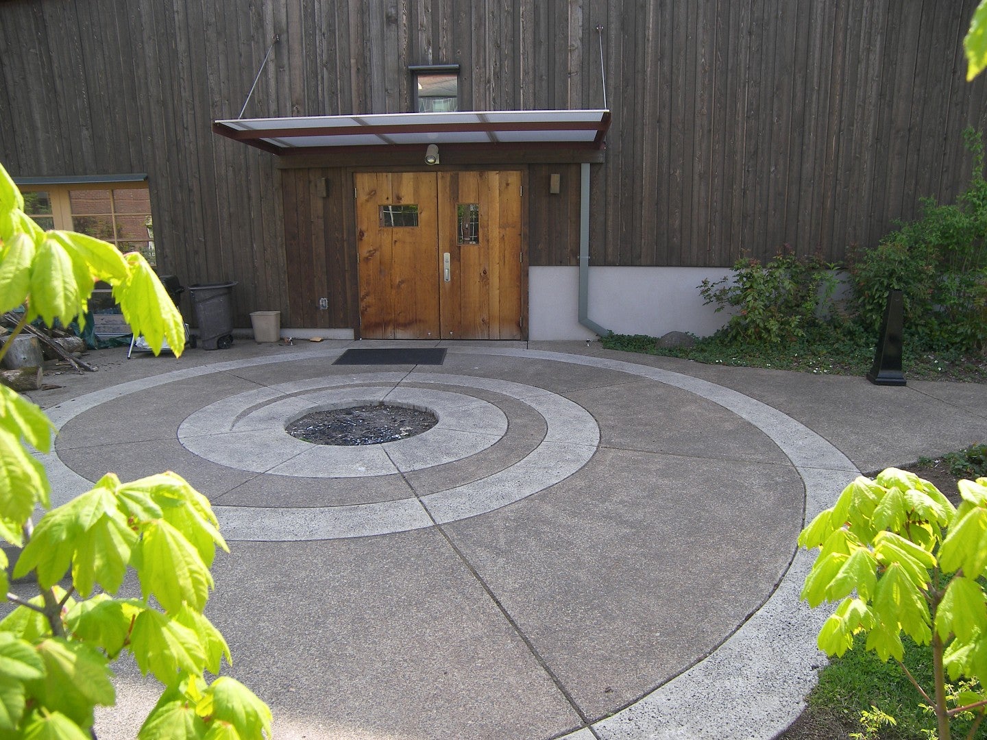 An "O" spiral on the ground outside the UO Longhouse.