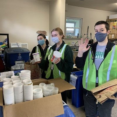 UO Sustainability Ambassadors accept and sort recyclable plastics for the UO plastics round-up.